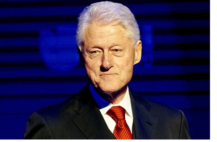 This image released by Univision shows former President Bill Clinton at the Univision Upfronts on Tuesday, May 12, 2015, in New York. Clinton, brought in by the Univision television network to talk to advertisers on Tuesday, May 12, urged companies to follow a policy of "radical inclusiveness" in their business dealings. Univision Communication Inc., which operates the Spanish-speaking Univision and other cable and digital properties, was outlining future programming plans for potential business partners. The company invited Clinton for a 15-minute question-and-answer session with Alicia Menendez, reporter for the Fusion network, and singer Ricky Martin for entertainment. (Phillip Angert/Univision via AP)